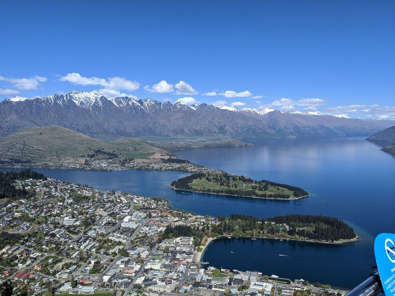 Queenstown New Zealand from atop a hill overlooking the city and lake