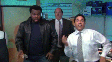 A GIF of Oscar, Darryl, and Kevin from the TV show The Office dancing. 